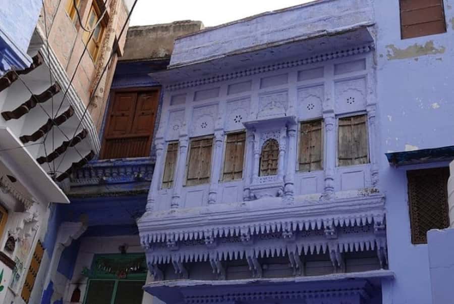 Blue City Heritage Walking Tour With Pick Up & Drop Off - Entering the Blue City at Pal Haveli, Clock Tower