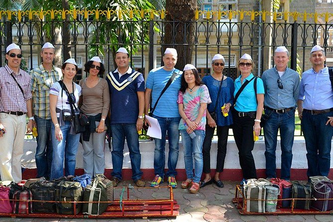 Dabbawala, Dhobi Ghat & Dharavi slum Tour with Local Train Ride - Dabbawalas and the Lunch-Delivery System You See Across Mumbai