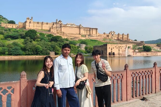 Explore Full Day Jaipur Guided Tour by Car with Guide - Jal Mahal and Panna Meena Stepwell: Photo Stops With Real Personality