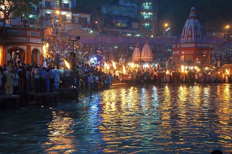 From Delhi: Rishikesh and Haridwar Day Trip - Rishikesh morning stops: Ram Jhula, Beatles Ashram area, and Triveni Ghat
