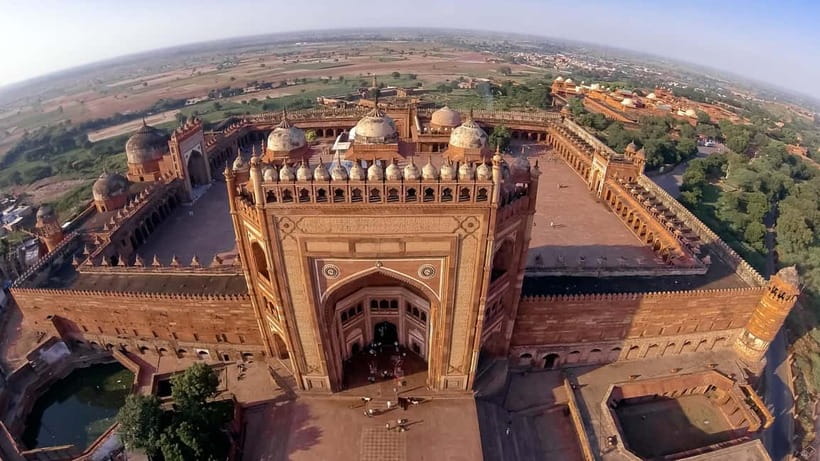 From Delhi: Taj Mahal & Agra With Fatehpur Sikri Day Tour - Agra Fort courtyards, palaces, and Taj views from inside