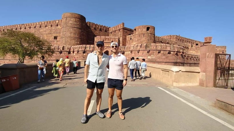 From Jaipur: Private Taj Mahal & Agra Day Trip with 5</em> Lunch – A private AC ride that keeps your day on your side’ /><br />
The best part of this tour is how it reduces decision fatigue. You start with pickup from your hotel or any location in Jaipur, then you move straight toward Agra in a private AC car. You also get practical extras for the day, like <strong>bottled water and umbrellas</strong>, which matter when weather and sun shift fast.</p>
<p><p>The total duration can range from <strong>3 to 12 hours</strong>, which is a big clue that the operator builds flexibility around your timing. If you want a quick day, you can often structure it with an end point in Agra. If you want the full return to Jaipur, you should plan for a longer day in the car.</p>
</p>
<p><p>Two things I really like for real life travel: first, you are not standing in lines to sort tickets or basic logistics. Second, your driver is part of the flow, so your local guide can focus on guiding, not herding.</p>
</p>
<h2 id="fast-track-taj-mahal-plus-a-guide-who-helps-you-see-it-better">Fast-track Taj Mahal, plus a guide who helps you see it better</h2>
<p> Lunch – Fast-track Taj Mahal, plus a guide who helps you see it better’ /><br />
The Taj Mahal is famous for a reason, but it can also feel chaotic. Here’s where the tour earns its keep. You get <strong>fast-track entry</strong>, and then you meet a licensed local guide who walks you through what you are actually looking at, not just where to walk.</p>
<p><p>You get <strong>up to about 3 hours at the Taj Mahal</strong>, which is enough time to do more than a rushed loop. I like that the guide work is built around storytelling and photo timing, so you can capture the views without feeling like you are wrestling the crowd the whole time. People in the field often help you find good spots and handle the usual scene of opportunistic photographers at key viewpoints.</p>
</p>
<p><p>Photo help shows up again and again in the feedback, with guides such as Ankur Sharma and Mehfooz helping people get multiple angles and poses. That is not fluff. When you are spending hours in a hot UNESCO site, small guidance can turn photos from random snapshots into images you actually like.</p>
</p>
<p><p>A key practical consideration: the Taj Mahal is <strong>closed every Friday</strong>. If your dates land on Friday, you either need to avoid this day trip or expect the tour to adjust accordingly.</p>
</p>
<h2 id="agra-fort-walking-tour-mughal-power-in-real-scale">Agra Fort walking tour: Mughal power in real scale</h2>
<p> Lunch – Agra Fort walking tour: Mughal power in real scale’ /><br />
After lunch, the day shifts from white marble to red stone at <strong>Agra Fort</strong>. This is the part many first-time visitors skip when they focus only on the Taj Mahal. I like that this tour gives you about <strong>1 hour</strong> at Agra Fort with a guide, which is the right length to learn the big picture and still walk the main viewpoints.</p>
<p><p>Agra Fort works because it is tactile. You can feel how this place was designed for control, movement, and display. With a guide, you are better able to connect walls and arches to the Mughal-era story, so it stops being just a strong fort and starts being a readable site.</p>
</p>
<p><p>The reviews also highlight comfort with crowds and timing. A good guide helps you move at a pace that feels calm, even when the area is busy.</p>
</p>
<div class="twil" style="margin: 20px 0; padding: 15px 0;">Compare these before you book anything in Jaipur<ul style="margin: 10px 0; padding-left: 0; list-style: none;"><li style="margin: 6px 0; line-height: 1.4;"><a href="https://indiatourreviews.com/full-day-jaipur-private-sightseeing-tour-by-car-with-guide/">Full-Day Jaipur Private Sightseeing Tour by Car with Guide</a><span style="margin-left: 8px; font-size: 0.82em; color: #555; white-space: nowrap;"><span style="color: #A62B4C;">★</span> 5.0 &middot; 472 reviews</span></li><li style="margin: 6px 0; line-height: 1.4;"><a href="https://indiatourreviews.com/pink-city-cooking-class/">Pink City Cooking Class</a><span style="margin-left: 8px; font-size: 0.82em; color: #555; white-space: nowrap;"><span style="color: #A62B4C;">★</span> 5.0 &middot; 452 reviews</span></li><li style="margin: 6px 0; line-height: 1.4;"><a href="https://indiatourreviews.com/private-full-day-jaipur-sightseeing-tour-by-tuk-tuk/">Private Full Day Jaipur Sightseeing Tour By Tuk Tuk</a><span style="margin-left: 8px; font-size: 0.82em; color: #555; white-space: nowrap;"><span style="color: #A62B4C;">★</span> 5.0 &middot; 382 reviews</span></li><li style="margin: 6px 0; line-height: 1.4;"><a href="https://indiatourreviews.com/private-guided-half-day-tour-jaipur/">Private Guided Half Day Tour Jaipur</a><span style="margin-left: 8px; font-size: 0.82em; color: #555; white-space: nowrap;"><span style="color: #A62B4C;">★</span> 5.0 &middot; 371 reviews</span></li><li style="margin: 6px 0; line-height: 1.4;"><a href="https://indiatourreviews.com/golden-triangle-ranthambore-4-day-private-tour-from-delhi/">Golden Triangle & Ranthambore: 4-Day Private Tour from Delhi</a><span style="margin-left: 8px; font-size: 0.82em; color: #555; white-space: nowrap;"><span style="color: #A62B4C;">★</span> 5.0 &middot; 355 reviews</span></li></ul></div><h2 id="baby-taj-the-quick-stop-that-often-feels-more-personal">Baby Taj: the quick stop that often feels more personal</h2>
<p><img width="689" height="650" decoding="async" src=
