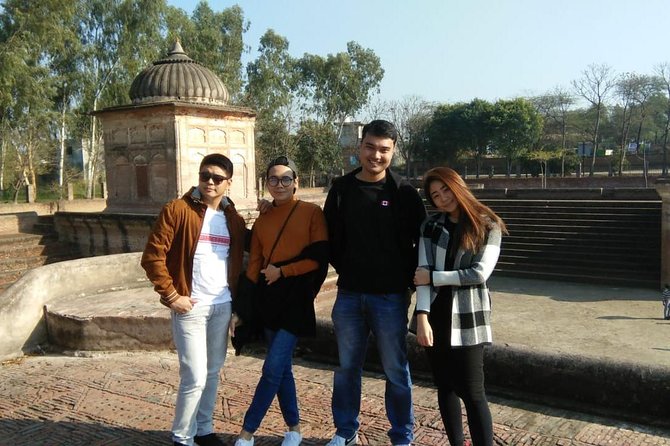 Full day Amritsar city tour with Wagah border ceremony - Entering the Golden Temple complex with a guide who explains what you’re seeing