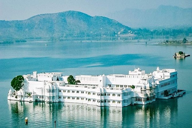 Full Day Udaipur Sightseeing Tour - Hotel pickup, bottled water, and A/C comfort