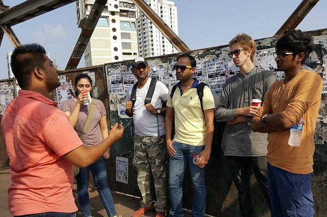 Group Tour of Dharavi Slum walk with local Guide - Leather, Pottery, Soap, Bakery, and Color Dye Stops