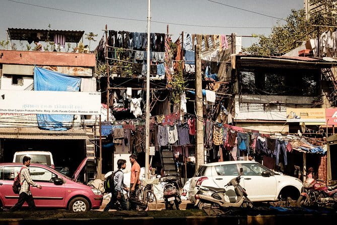 Gufran’s Slum Home Tour in the Mumbai Slums - Traditional laundry washing: watch, then follow your guide’s cues