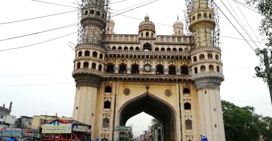 Hyderabad: Heritage Walking Tour of Old City and Charminar - Mecca Masjid: walking from market sounds to prayer-scale architecture