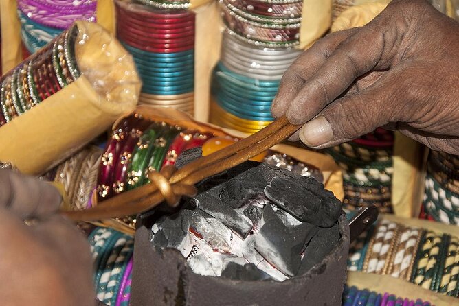 Jaipur Half-Day Shopping Tour with Hand Block Printing Class - Maniharo Ka Rasta: lac bangle shaping you can see happening