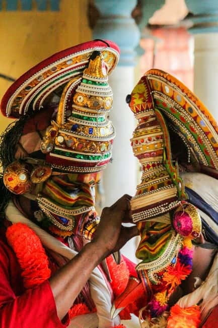 Kochi: Kathakali, Theyyam, and Kalaripayattu Evening Show - Theyyam onstage, ritual dance with a trance-like feel