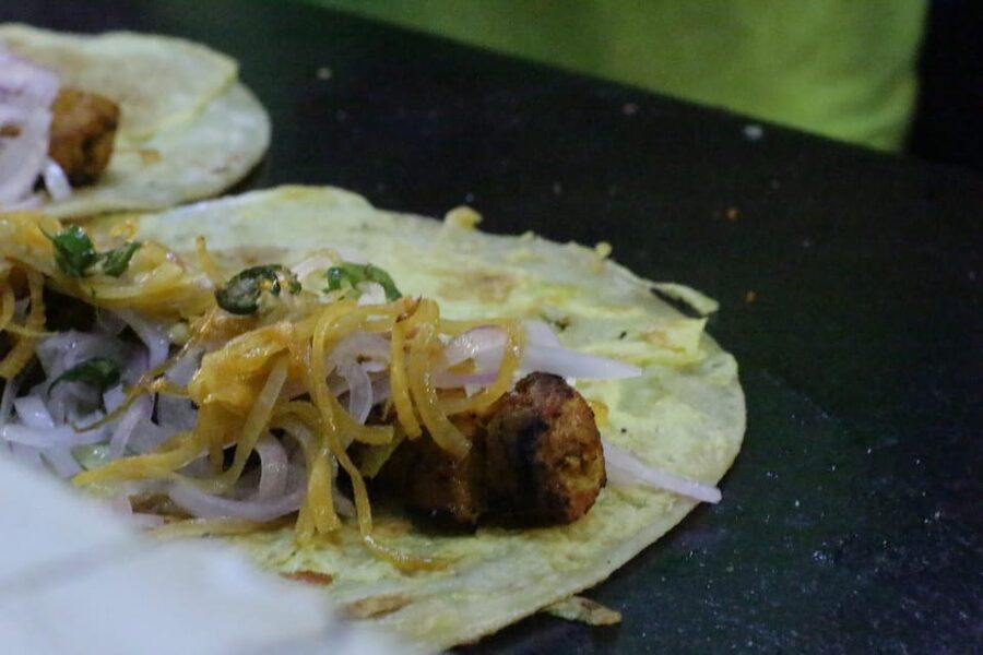 Kolkata Midtown Madness- A Street Food & Nightlife Tour - College Street sweets and the coconut drink cafe with freedom-fighter lore