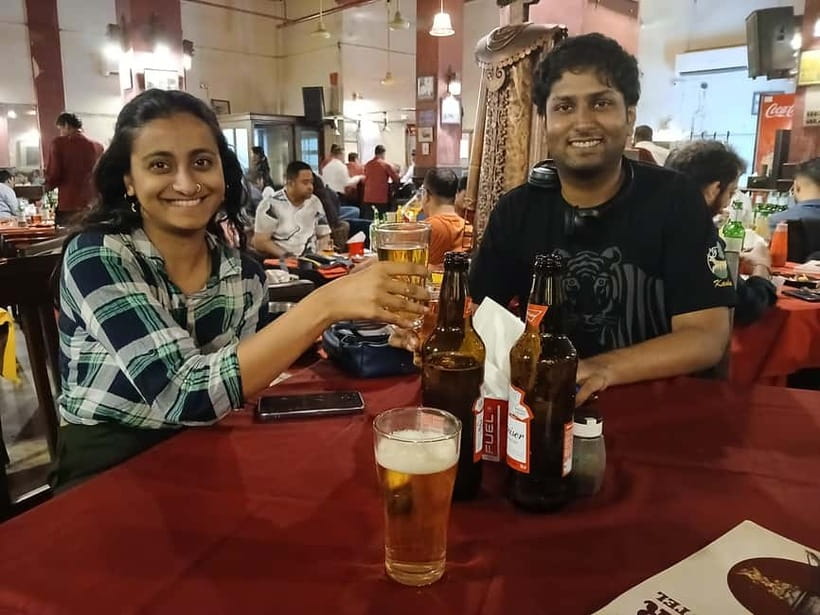 Kolkata Midtown Madness- A Street Food & Nightlife Tour - Bus ride to classic fritters: mango fritters and onion fritters