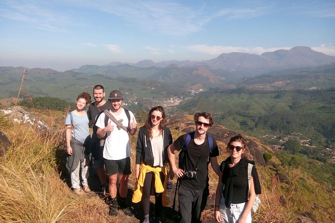 Medium Hard Trekking (munnar valley Trekking & Tours ) - The 10:30 am stop at 2100 m, fruits, snacks, and a reset for your legs