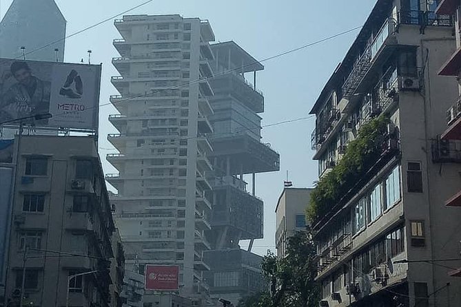 Mumbai City of Dreams Tour in Private Vehicle - Pickup, bottled water, and how the car changes the day