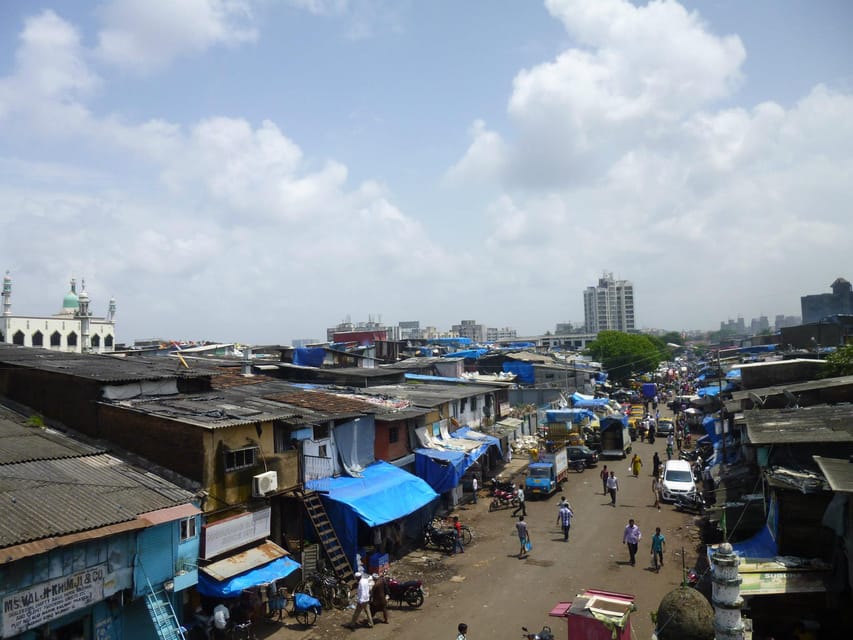 Mumbai: Dharavi Slum 2-Hour Walking Tour - Meeting at Mahim: Café Coffee Day and what to know before you walk