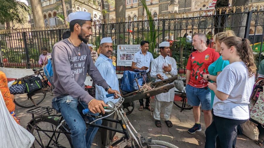 Mumbai: Dharavi Slum, DhobiGhat, and Dabbawallas Tour - Starting at Churchgate and using local trains