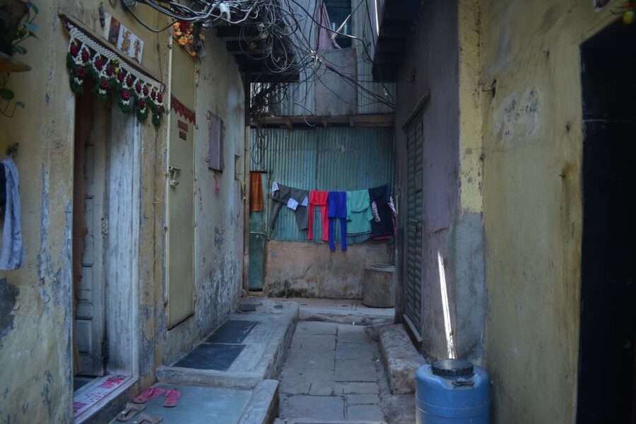 Mumbai: Dharavi Slum Tour with Dhobi Ghat (Open-Air Laundry) - Walking logistics: shoes, water, rain or shine, and limited restrooms