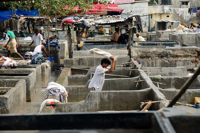 Mumbai: Dhobi Ghat Laundry & Dharavi Slum Tour with a Local - Slumdog Millionaire Filming Spot: Seeing the Movie Trace Without the Simplification