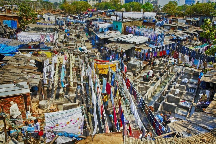 Mumbai: Guided City Sightseeing Tour - Mani Bhavan and Banganga Tank, where the mood shifts