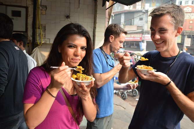 Old Delhi Photography & Food Tour with Rickshaw Ride to Masterji Kee Haveli - Pasar Chandni Chowk: Food, Heritage, and Local Questions