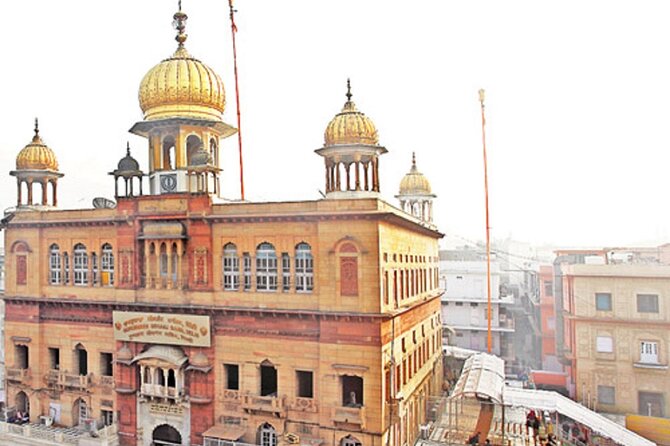 Old Delhi Temples, Cultural, Heritage Walking Street Food Tour - Naughara, the row of nine houses, and a quick architectural pause