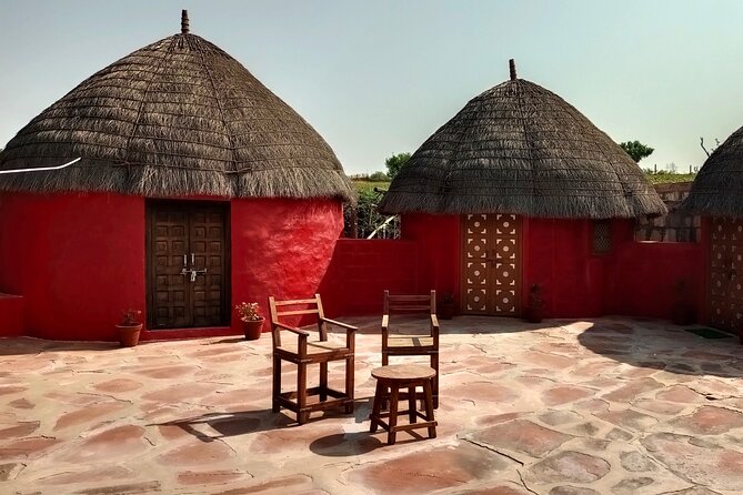 Overnight Desert Stay with Camel Safari and Homemade Food - OM - Family homestay setting: huts, open sky, and real-world simplicity