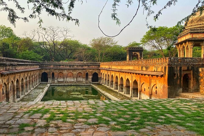 Premium Hidden Jewels of Delhi Cycling Tour - The First Chapter of Delhi - Flower market energy and Mehrauli’s honey-stoned monuments