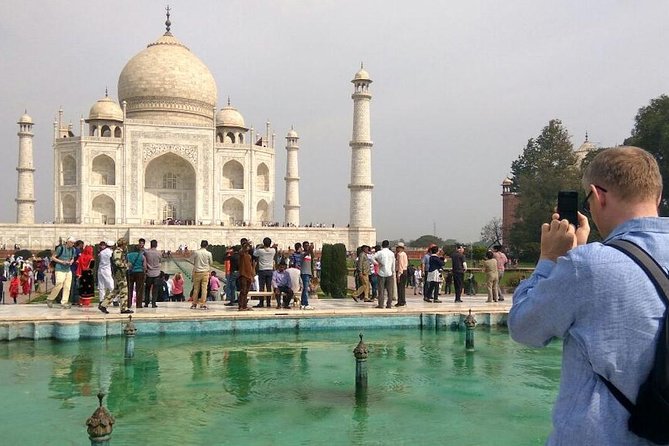 Private day tour from Delhi to Taj Mahal and Agra Fort with guide - Pickup, drive time, and how the guide uses the road