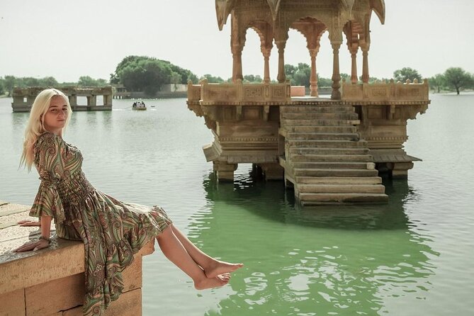 Private Full-Day Tour of Golden City Jaisalmer with Guide - Nathmal Ji Ki Haveli, ornate carvings in a tight town-lane setting