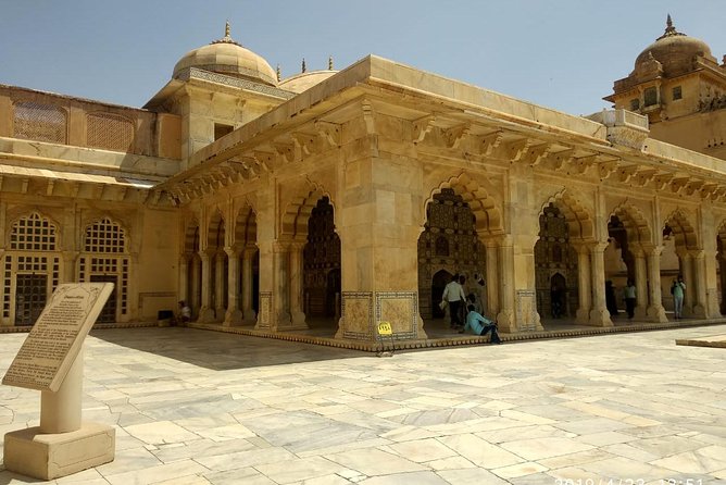 Private Jaipur Full One Day Tour In Pink City With Guide - Shopping time for textiles, gems, and pottery, with a real choice