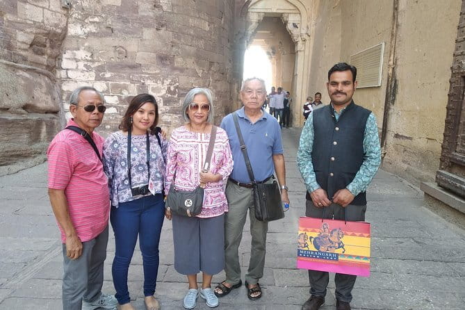 Private Jodhpur City Sightseeing Tour By Car with Tour Guide - Quick hits in the old city: Ghanta Ghar and Toorji Ka Jhalra