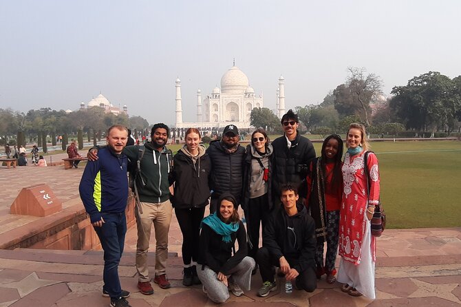 Private Sunrise Taj Mahal Tour by Car from Delhi - All Inclusive - Agra Fort: UNESCO scale, Mughal power, and real structure