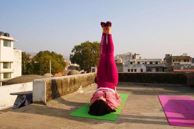 Rooftop Yoga in Jaipur – Includes Transport, Tea & Instructor - Rooftop yoga with Jaipur in the background