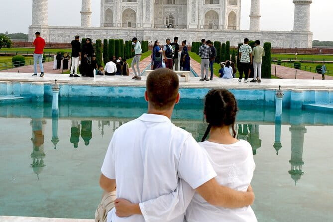 Taj Mahal Sunrise & Agra Day Tour from Delhi with 5<em> Meal – Key Highlights You’ll Care About’ /></p>
<ul>
<li><strong>Ticket handling at each monument</strong> so you do not waste time buying in the moment</li>
<li><strong>Private guide time inside Taj Mahal and Agra Fort</strong> to help you see the details that matter</li>
<li><strong>Yamuna Expressway drive</strong> for a smoother route to Agra</li>
<li><strong>Courtyard Agra meal break</strong> (when you choose the meal option) to reset before more sights</li>
<li><strong>Baby Taj visit (Itimad-ud-Daulah)</strong> for a calmer, shorter finale to the day</li>
<li><strong>Flexible pickup and drop-off</strong> across Delhi, Noida, and Gurugram, plus water bottles</li>
</ul>
<div class="twil" style="margin: 20px 0; padding: 15px 0;"><p>Still choosing your Taj Mahal ticket? Compare these</p><ul style="margin: 10px 0; padding: 0; list-style: none; display: grid; grid-template-columns: repeat(auto-fill, minmax(250px, 1fr)); gap: 14px;"><li style="border: 1px solid #e5e5e5; border-radius: 8px; overflow: hidden; line-height: 1.4; background: #fff;"><a href="https://indiatourreviews.com/same-day-taj-mahal-agra-fort-baby-taj-tour-from-delhi-by-car/" aria-hidden="true" tabindex="-1"><img decoding="async" style="width: 100%; height: 150px; object-fit: cover; display: block;" src="https://asset.indiatourreviews.com/wp-content/uploads/same-day-taj-mahal-agra-fort-baby-taj-tour-from-delhi-by-car-400x267.jpg" alt="" loading="lazy"></a><div style="padding: 10px 12px;"><a href="https://indiatourreviews.com/same-day-taj-mahal-agra-fort-baby-taj-tour-from-delhi-by-car/" style="font-weight: 600;">Same Day Taj Mahal, Agra Fort & Baby Taj Tour from Delhi by Car</a><br><span style="font-size: 0.82em; color: #555; margin-top: 4px;"><span style="color: #A62B4C;">★</span> 5.0 &middot; 4,304 reviews</span></div></li><li style="border: 1px solid #e5e5e5; border-radius: 8px; overflow: hidden; line-height: 1.4; background: #fff;"><a href="https://indiatourreviews.com/taj-mahal-day-tour-from-delhi-by-superfast-train-top-rated-tour/" aria-hidden="true" tabindex="-1"><img decoding="async" style="width: 100%; height: 150px; object-fit: cover; display: block;" src="https://asset.indiatourreviews.com/wp-content/uploads/taj-mahal-day-tour-from-delhi-by-superfast-train-top-rated-tour-400x267.jpg" alt="" loading="lazy"></a><div style="padding: 10px 12px;"><a href="https://indiatourreviews.com/taj-mahal-day-tour-from-delhi-by-superfast-train-top-rated-tour/" style="font-weight: 600;">Taj Mahal Day Tour from Delhi by Superfast Train – TOP RATED TOUR</a><br><span style="font-size: 0.82em; color: #555; margin-top: 4px;"><span style="color: #A62B4C;">★</span> 5.0 &middot; 4,166 reviews</span></div></li><li style="border: 1px solid #e5e5e5; border-radius: 8px; overflow: hidden; line-height: 1.4; background: #fff;"><a href="https://indiatourreviews.com/full-day-taj-mahal-agra-fort-baby-taj-tour-from-delhi-by-car/" aria-hidden="true" tabindex="-1"><img decoding="async" style="width: 100%; height: 150px; object-fit: cover; display: block;" src="https://asset.indiatourreviews.com/wp-content/uploads/full-day-taj-mahal-agra-fort-baby-taj-tour-from-delhi-by-car-400x267.jpg" alt="" loading="lazy"></a><div style="padding: 10px 12px;"><a href="https://indiatourreviews.com/full-day-taj-mahal-agra-fort-baby-taj-tour-from-delhi-by-car/" style="font-weight: 600;">Full Day Taj Mahal, Agra Fort & Baby Taj Tour from Delhi by Car</a><br><span style="font-size: 0.82em; color: #555; margin-top: 4px;"><span style="color: #A62B4C;">★</span> 5.0 &middot; 3,647 reviews</span></div></li><li style="border: 1px solid #e5e5e5; border-radius: 8px; overflow: hidden; line-height: 1.4; background: #fff;"><a href="https://indiatourreviews.com/from-delhi-taj-mahal-agra-private-day-trip-with-transfers/" aria-hidden="true" tabindex="-1"><img decoding="async" style="width: 100%; height: 150px; object-fit: cover; display: block;" src="https://asset.indiatourreviews.com/wp-content/uploads/from-delhi-taj-mahal-agra-private-day-trip-with-transfers-400x267.jpg" alt="" loading="lazy"></a><div style="padding: 10px 12px;"><a href="https://indiatourreviews.com/from-delhi-taj-mahal-agra-private-day-trip-with-transfers/" style="font-weight: 600;">From Delhi: Taj Mahal & Agra Private Day Trip with Transfers</a><br><span style="font-size: 0.82em; color: #555; margin-top: 4px;"><span style="color: #A62B4C;">★</span> 4.9 &middot; 3,181 reviews</span></div></li></ul></div><h2 id="from-delhi-to-agra-why-a-sunrise-style-day-actually-makes-sense">From Delhi to Agra, Why a Sunrise-Style Day Actually Makes Sense</h2>
<p> Meal – From Delhi to Agra, Why a Sunrise-Style Day Actually Makes Sense’ /><br />
This is one of those plans that works when you have limited time. You start in Delhi and then get a full Agra circuit in a single day: the Taj Mahal, Agra Fort, and the Baby Taj. It is not trying to impress you with 20 stops. It focuses on the famous ones that you will remember.</p>
<p><p>I like the logic here. When the day is short, you want a simple route and clear timing, not random hopping around. This tour gives you a driver, a guide, and guided time at the key sites. You can also tell the driver when you want restroom and refreshment breaks, which matters on a long road day.</p>
</p>
<p><p>There is also a real comfort factor. You ride in a private air-conditioned car both ways. That makes a big difference when you are traveling for hours and then doing sightseeing in the heat, crowds, and bright light.</p>
</p>
<h2 id="price-and-what-youre-getting-for-the-money">Price and What You’re Getting for the Money</h2>
<p><img width="669" height="446" decoding="async" src=