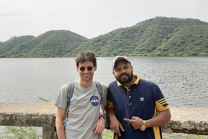 Udaipur Full Day Sightseeing Tour by Private Car - Sahelion ki Bari gardens: fountains, pools, and marble elephants
