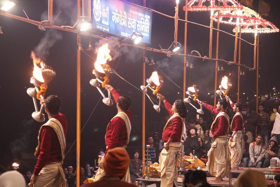 Varanasi: Ganga Arti Evening Light Ceremony on the Main Ghat - The 45-minute Ganges boat cruise: views plus the hard-to-avoid reality