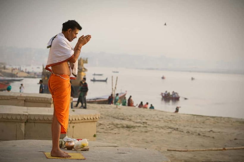 Varanasi: Half-Day City Tour & Evening Aarti with Boat Ride - The Ganges boat ride, watching the river as the ritual turns evening