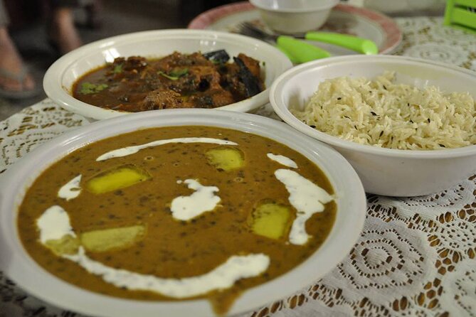 Veg and Non veg : Private Cooking Class in Delhi home (7 meal) - Entering a Delhi home kitchen, not a restaurant lesson